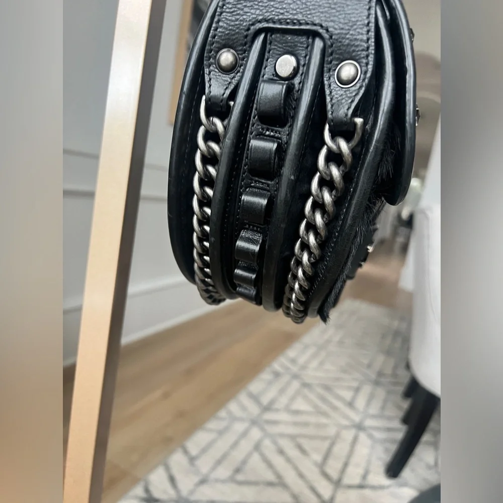 CHANEL Black Quilted & Fur Star-Studded Saddle Bag